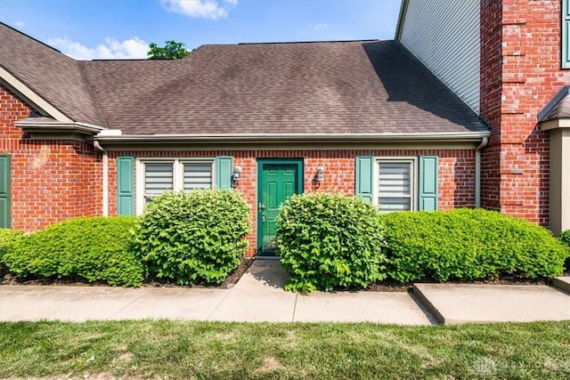 113 Village Trail Dr Unit 6, Vandalia, OH 45377 - entrance to property featuring roof with shingles and brick siding
