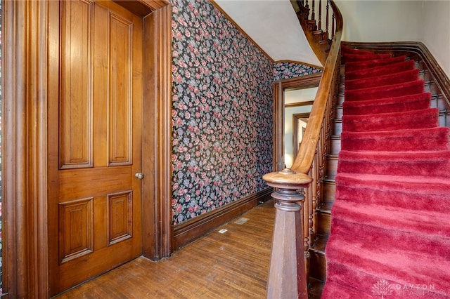 18 E Washington St, Jamestown Vlg, OH 45335 - stairs with wallpapered walls and wood finished floors
