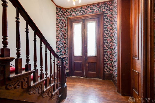 18 E Washington St, Jamestown Vlg, OH 45335 - foyer featuring wallpapered walls, wood finished floors, ornamental molding, and stairway