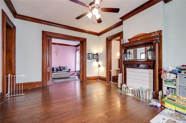 18 E Washington St, Jamestown Vlg, OH 45335 - living room featuring crown molding, wood finished floors, and a ceiling fan