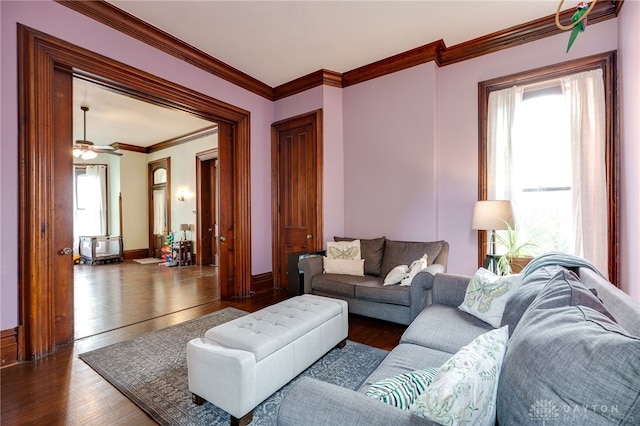 18 E Washington St, Jamestown Vlg, OH 45335 - living room featuring dark wood finished floors, ornamental molding, and a ceiling fan