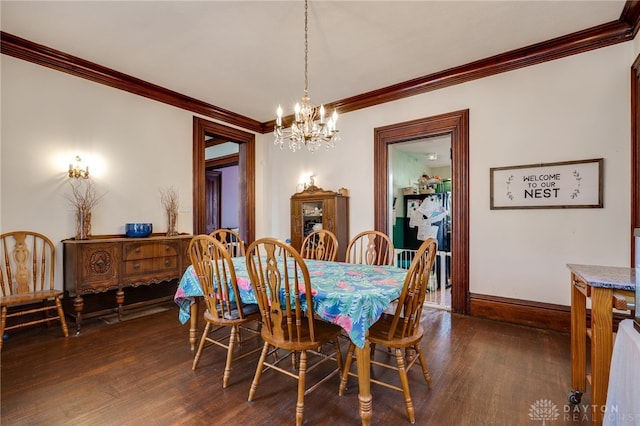 18 E Washington St, Jamestown Vlg, OH 45335 - dining space featuring a chandelier, crown molding, and dark wood-style flooring