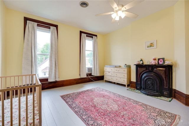 18 E Washington St, Jamestown Vlg, OH 45335 - bedroom with ceiling fan and wood finished floors