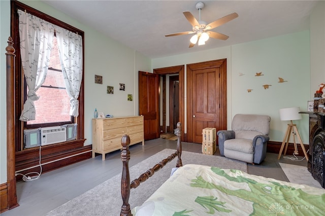 18 E Washington St, Jamestown Vlg, OH 45335 - bedroom with wood finished floors, a ceiling fan, radiator heating unit, and cooling unit
