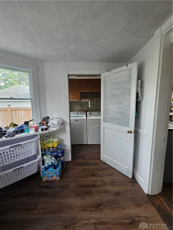 126 S Maple St, Eaton, OH 45320 - dining space with washing machine and clothes dryer and dark wood-style flooring
