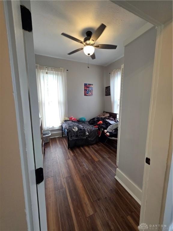 126 S Maple St, Eaton, OH 45320 - bedroom featuring dark wood-style floors and a ceiling fan