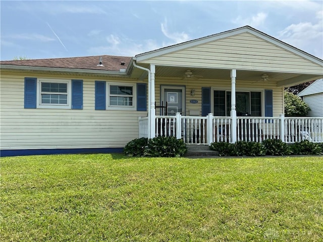 5362 Middlebury Rd, Dayton, OH 45432 - view of front of home with a front yard, ceiling fan, and covered porch
