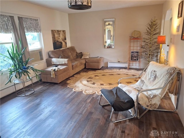 291 Chamberlin Rd, Carlisle, OH 45005 - living area with baseboard heating, wood finished floors, and cooling unit
