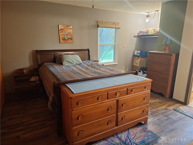 291 Chamberlin Rd, Carlisle, OH 45005 - bedroom featuring light wood-type flooring and gas water heater