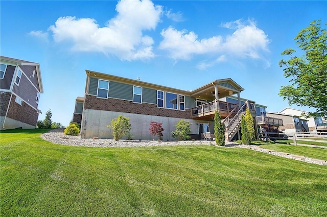 5078 Magellan Way, Franklin, OH 45005 - rear view of house with stairs, a deck, a yard, and brick siding