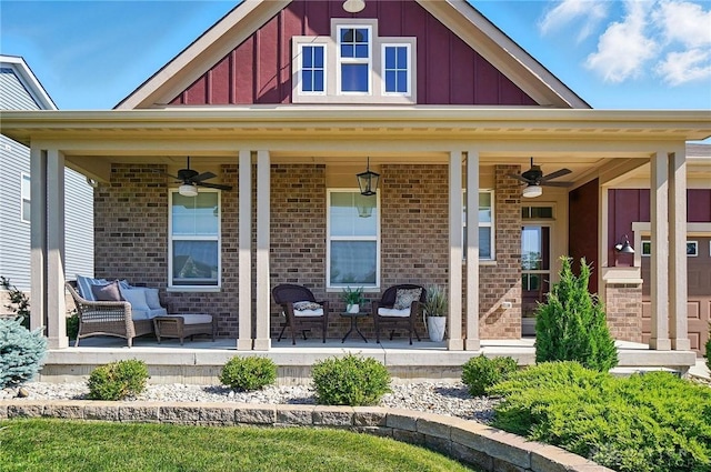 5078 Magellan Way, Franklin, OH 45005 - view of front of house with ceiling fan, board and batten siding, covered porch, and brick siding