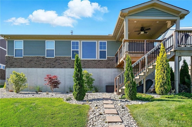 5078 Magellan Way, Franklin, OH 45005 - view of front of house with ceiling fan, brick siding, a front yard, and stairs