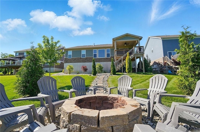 5078 Magellan Way, Franklin, OH 45005 - view of patio / terrace with a fire pit, stairway, and ceiling fan