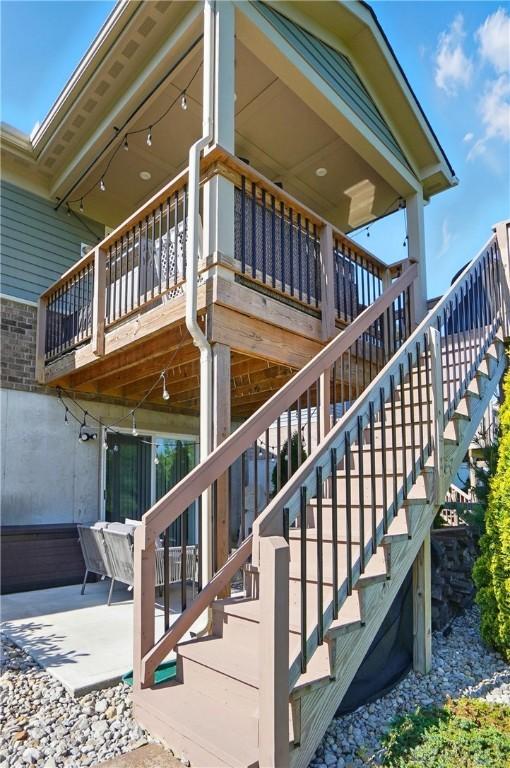 5078 Magellan Way, Franklin, OH 45005 - view of side of property with stairway and a patio