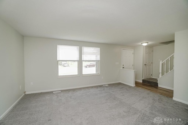 2949 N Bend Rd, Cincinnati, OH 45239 - carpeted spare room featuring stairs and baseboards