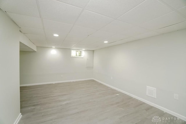 2949 N Bend Rd, Cincinnati, OH 45239 - basement featuring a paneled ceiling, light wood-type flooring, and recessed lighting