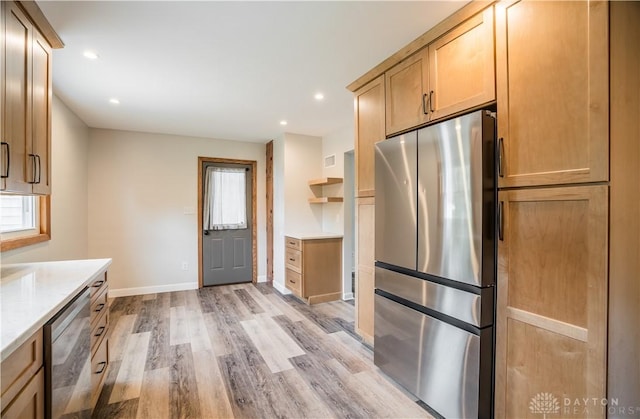 235 Stonequarry Rd, Vandalia, OH 45377 - kitchen featuring appliances with stainless steel finishes, light wood-style floors, open shelves, light countertops, and recessed lighting
