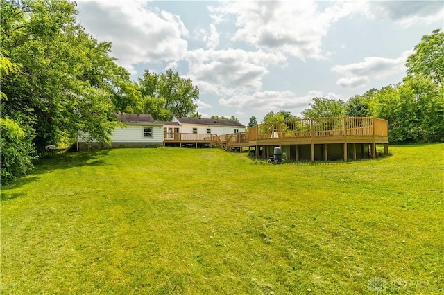 235 Stonequarry Rd, Vandalia, OH 45377 - view of grassy yard featuring a wooden deck