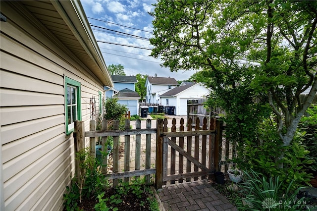 301 E Peach Orchard Ave, Oakwood, OH 45419 - gate with an outbuilding and a residential view