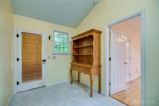 301 E Peach Orchard Ave, Oakwood, OH 45419 - doorway with lofted ceiling and baseboards