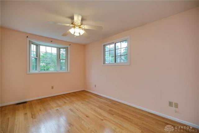 301 E Peach Orchard Ave, Oakwood, OH 45419 - spare room featuring light wood-style floors and a ceiling fan