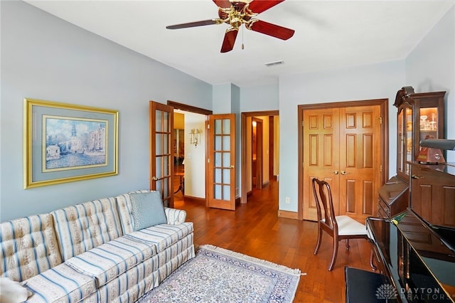 1106 Roger Scott Dr, Bellbrook, OH 45305 - living area with french doors, wood finished floors, and a ceiling fan