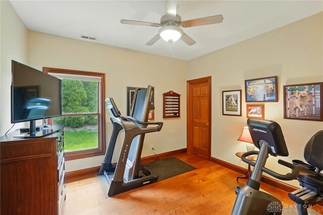 1106 Roger Scott Dr, Bellbrook, OH 45305 - workout area with light wood finished floors and ceiling fan