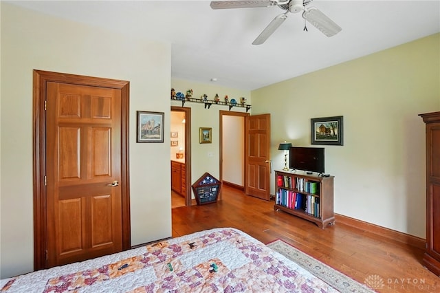 1106 Roger Scott Dr, Bellbrook, OH 45305 - bedroom with wood finished floors and a ceiling fan