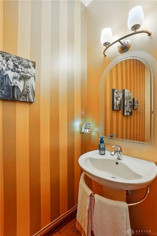 1106 Roger Scott Dr, Bellbrook, OH 45305 - bathroom with wood finished floors and a sink