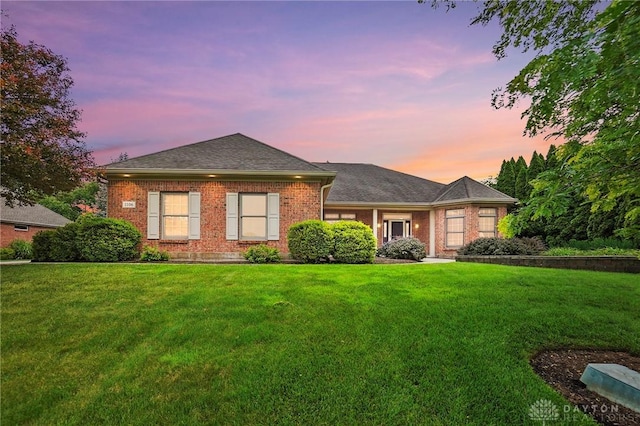 1106 Roger Scott Dr, Bellbrook, OH 45305 - ranch-style home featuring a lawn, brick siding, and a shingled roof