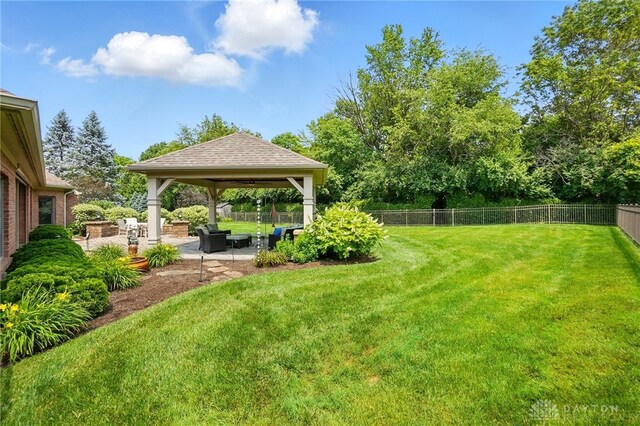 1106 Roger Scott Dr, Bellbrook, OH 45305 - fenced backyard with a gazebo and a patio