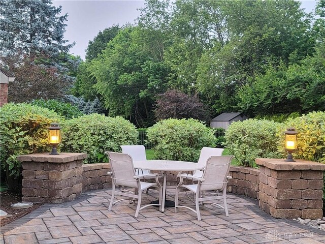1106 Roger Scott Dr, Bellbrook, OH 45305 - view of patio / terrace featuring outdoor dining space
