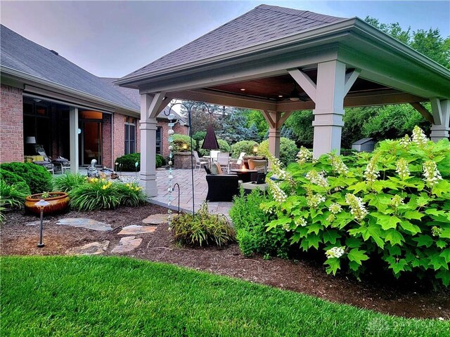 1106 Roger Scott Dr, Bellbrook, OH 45305 - view of yard with a gazebo, a patio area, and an outdoor fire pit