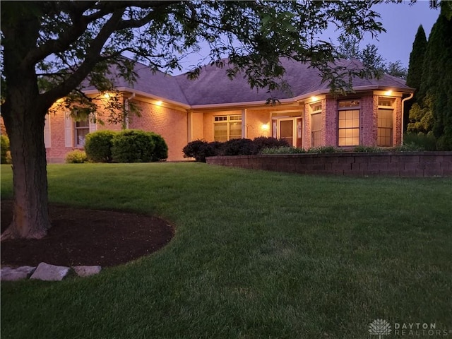 1106 Roger Scott Dr, Bellbrook, OH 45305 - view of front of home with a front yard and brick siding