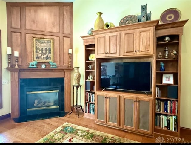 1106 Roger Scott Dr, Bellbrook, OH 45305 - living room with wood finished floors and a fireplace
