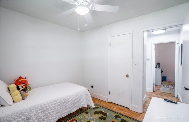 2435 S County Road 25a, Troy, OH 45373 - bedroom featuring light wood-type flooring and a ceiling fan