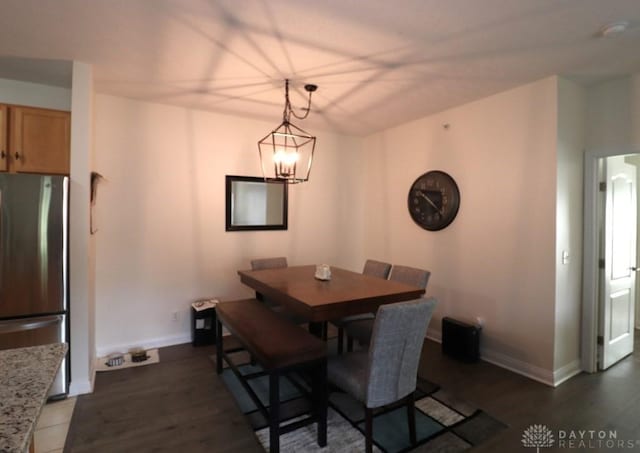 3224 Grand Falls Blvd, Maineville, OH 45039 - dining room featuring wood finished floors and a chandelier