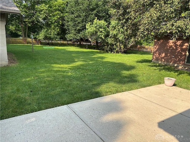 215 W Martindale Rd, Englewood, OH 45322 - fenced backyard featuring a patio