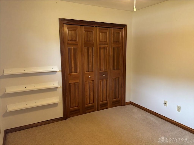215 W Martindale Rd, Englewood, OH 45322 - unfurnished bedroom featuring carpet and baseboards