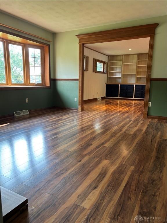 215 W Martindale Rd, Englewood, OH 45322 - unfurnished living room featuring wood finished floors