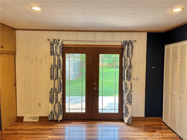215 W Martindale Rd, Englewood, OH 45322 - entryway featuring french doors, wood finished floors, crown molding, and recessed lighting