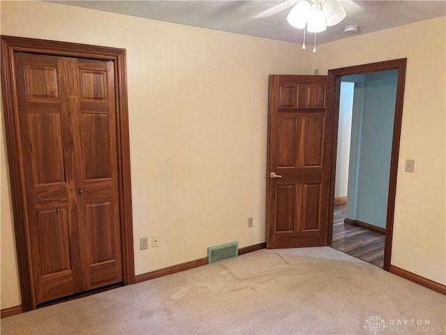 215 W Martindale Rd, Englewood, OH 45322 - carpeted empty room with ceiling fan and a smoke detector