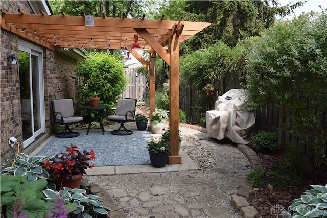 5468 Split Rock Dr, Dayton, OH 45424 - view of patio featuring a pergola and grilling area