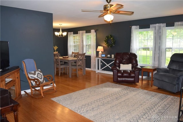 5468 Split Rock Dr, Dayton, OH 45424 - living area with a chandelier, wood finished floors, and ceiling fan