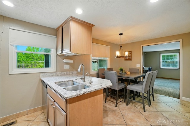 2946 Rockledge Trl, Beavercreek, OH 45430 - kitchen featuring light tile patterned flooring, hanging light fixtures, light stone counters, recessed lighting, and a chandelier