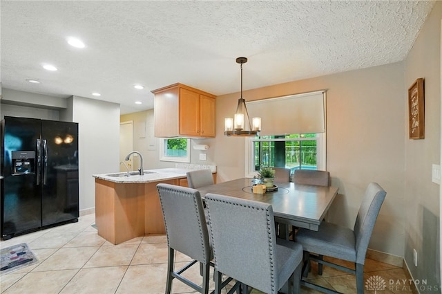 2946 Rockledge Trl, Beavercreek, OH 45430 - dining room featuring recessed lighting, a textured ceiling, a chandelier, and light tile patterned floors
