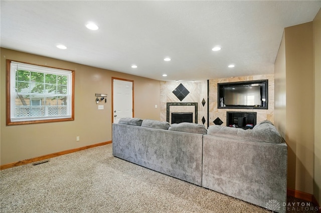 2946 Rockledge Trl, Beavercreek, OH 45430 - carpeted living area featuring a tiled fireplace and recessed lighting