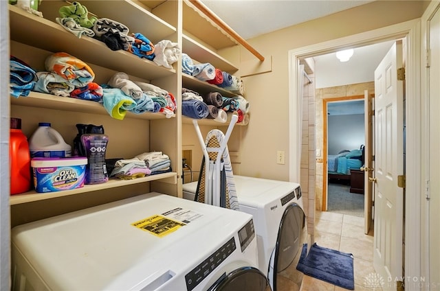 2946 Rockledge Trl, Beavercreek, OH 45430 - laundry room with washing machine and dryer and light tile patterned floors