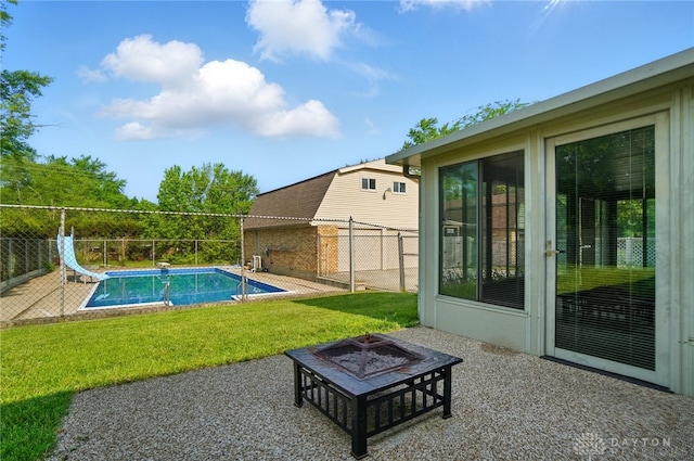 2946 Rockledge Trl, Beavercreek, OH 45430 - view of pool featuring a water slide, a fire pit, and a patio