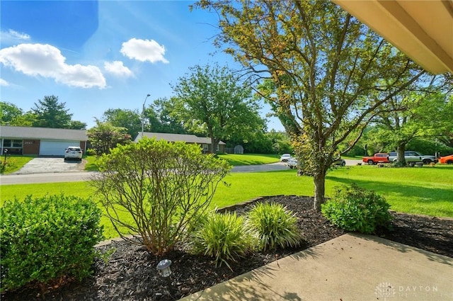 2946 Rockledge Trl, Beavercreek, OH 45430 - view of grassy yard with a garage